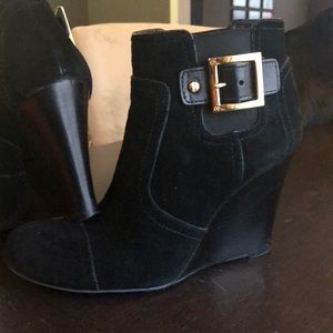 Tory Burch black suede wedge booties.